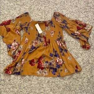 Did the shoulder floral top